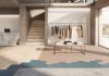 Self-adhesive underlay for dryback LVT